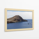 Acantilado Rocoso con Arco Natural y Mar Azul - Wandering Pixels Co. | Cuadro decorativo de Canvas Lab