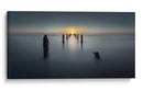 Puesta de sol sobre pilotes oceánicos - Nadav Jonas | Cuadro decorativo de Canvas Lab