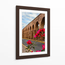 Flor de camelina enmarcando el acueducto de Morelia. - Nosion | Cuadro decorativo de Canvas Lab