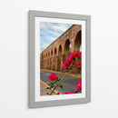 Flor de camelina enmarcando el acueducto de Morelia. - Nosion | Cuadro decorativo de Canvas Lab