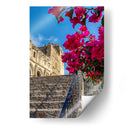 Histórico Monasterio de Yuriria enmarcado por vibrantes bugambilias bajo un cielo azul despejado. - Nosion | Cuadro decorativo de Canvas Lab